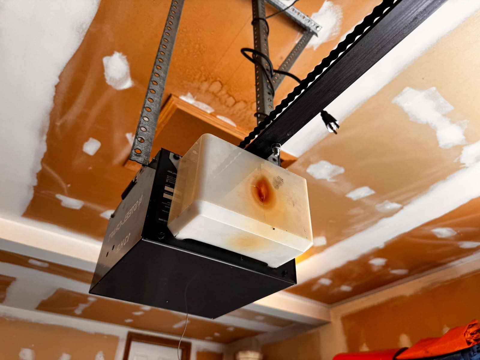 Old garage door opener before replacement